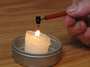melting wax in a kistka tool